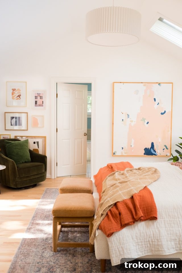 Cozy cottage bedroom featuring warm textures and soft lighting, enhanced by natural daylight from skylights by Ashley Rose of Sugar & Cloth.