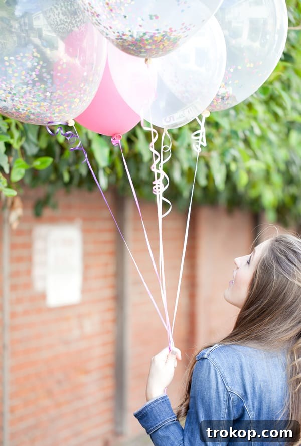Money Balloons, clear balloons filled with rolled dollar bills