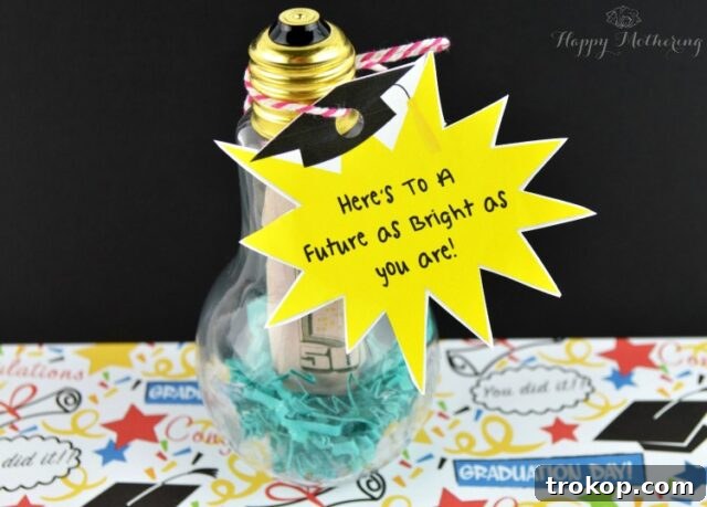 Light Bulb Cash Holder, with rolled bills inside a decorative light bulb
