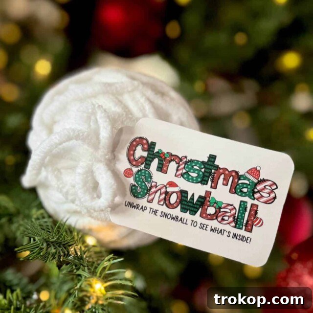 Christmas Snowball gift, a gift card wrapped in chenille yarn