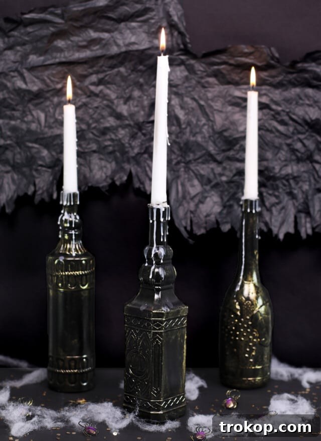 Dollar Store Halloween Candle Holders made from recycled bottles