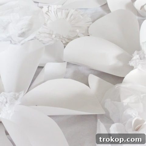 DIY paper flower backdrop by Sugar & Cloth