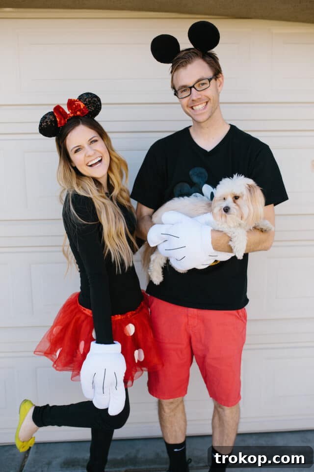 22 Pawsome Matching Halloween Costumes for Couples and Their Dogs 13 Mickey Mouse, Minnie Mouse, and Pluto (dog) Halloween costume for a couple and their pet.