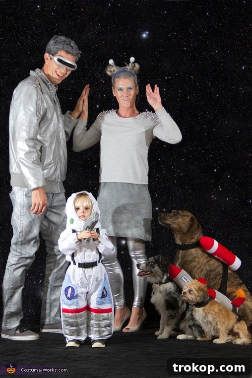 22 Pawsome Matching Halloween Costumes for Couples and Their Dogs 15 Space exploration themed Halloween costume with astronauts and an alien dog.