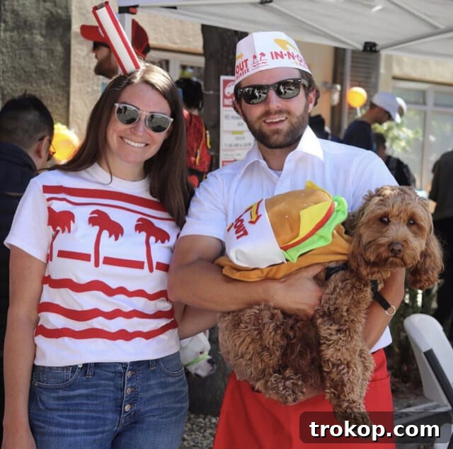 22 Pawsome Matching Halloween Costumes for Couples and Their Dogs 22 In-N-Out family Halloween costume with a couple as burger and soda, and their dog as a cheeseburger.