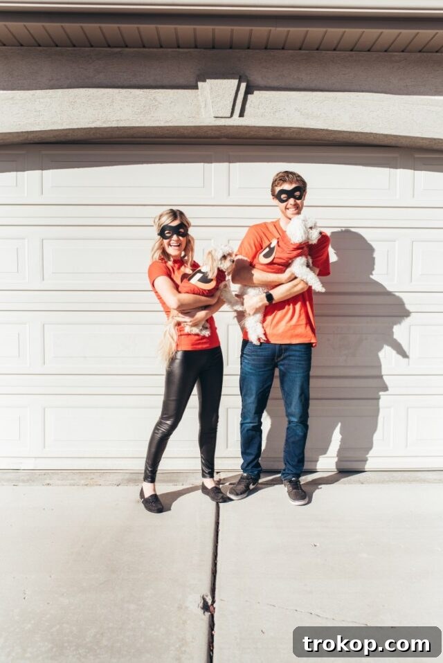 22 Pawsome Matching Halloween Costumes for Couples and Their Dogs 9 The Incredibles family Halloween costume featuring a couple and their dog, a super easy DIY idea.