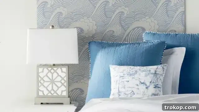 Crafting Your Dream Bedroom: DIY Headboard Inspiration 12 Simple and stylish DIY wallpaper headboard for an artistic bedroom touch.