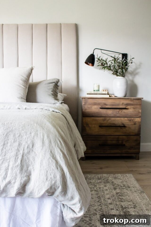 Crafting Your Dream Bedroom: DIY Headboard Inspiration 17 Elegant DIY upholstered headboard, creating a high-end designer look without sewing.