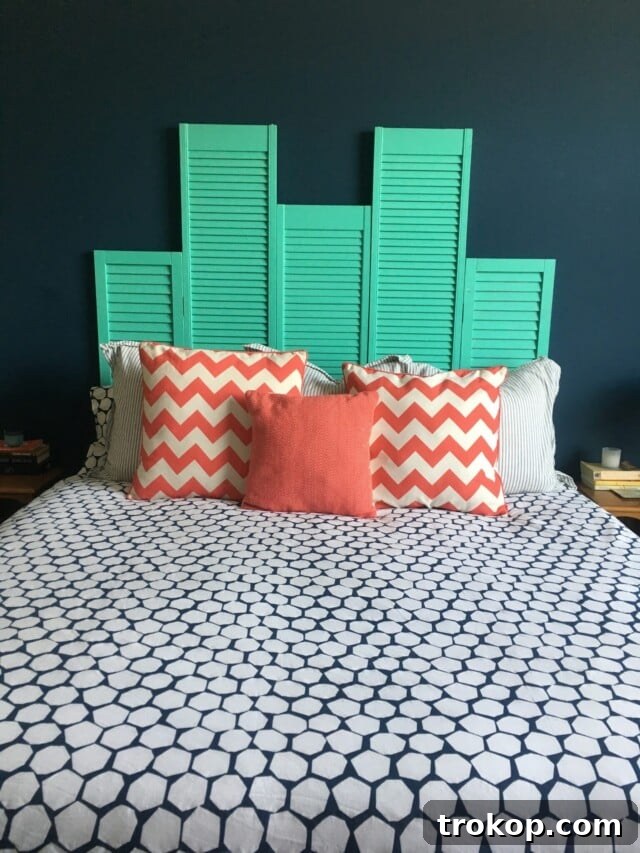 Crafting Your Dream Bedroom: DIY Headboard Inspiration 20 Charming DIY shutter headboard, bringing a nostalgic feel to your bedroom.