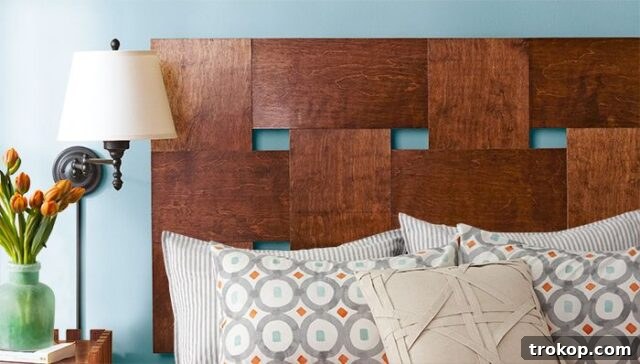 Crafting Your Dream Bedroom: DIY Headboard Inspiration 8 Artistic wooden woven headboard, a simple DIY project for any bed size.