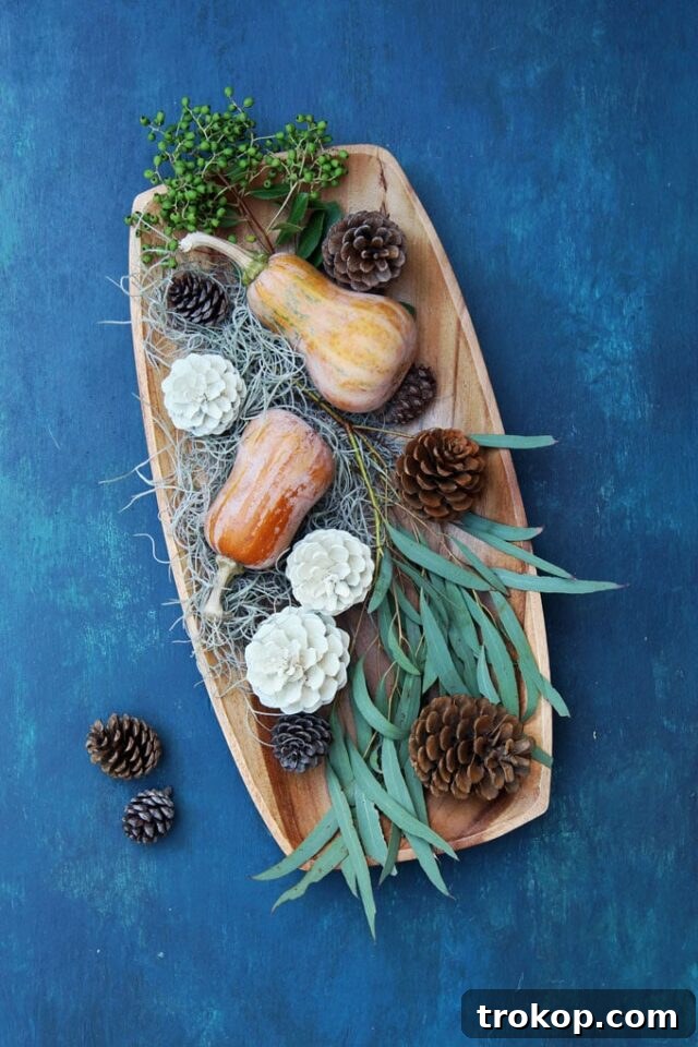 Creative Thanksgiving Table Decor: DIY Ideas for a Festive Feast 11 Simple Gourd and Pinecone Centerpiece for Thanksgiving