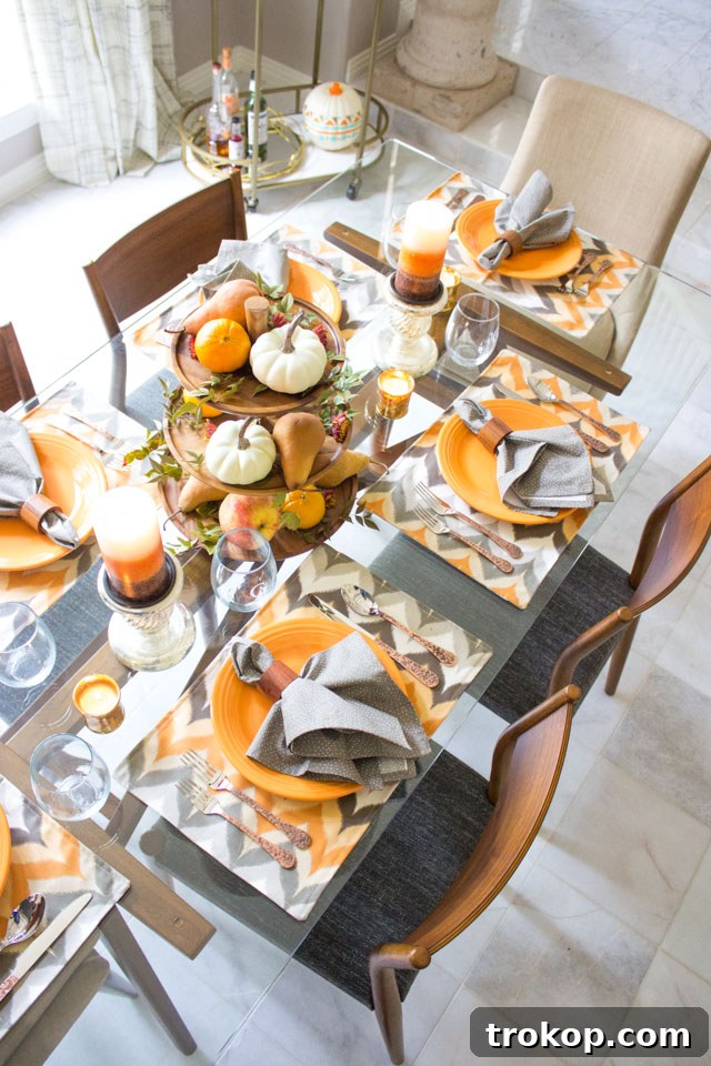 Creative Thanksgiving Table Decor: DIY Ideas for a Festive Feast 15 Tiered Centerpiece displaying fall harvest items