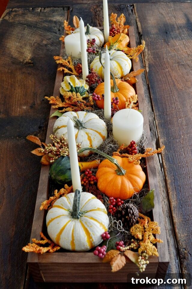 Creative Thanksgiving Table Decor: DIY Ideas for a Festive Feast 21 Pumpkin-Filled Planter as a Thanksgiving table centerpiece