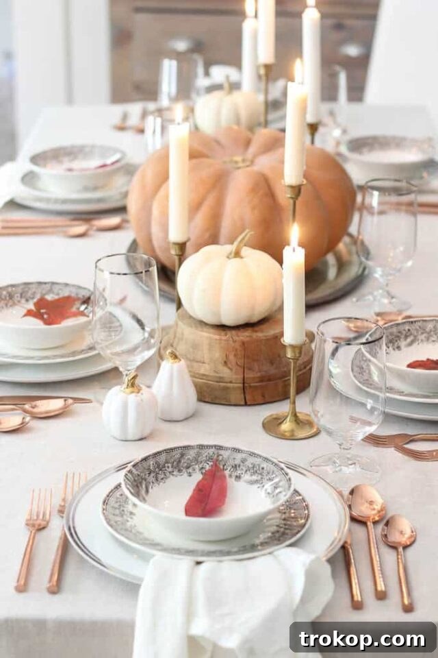 Creative Thanksgiving Table Decor: DIY Ideas for a Festive Feast 30 Pumpkins and Candlelight Centerpiece for a cozy Thanksgiving