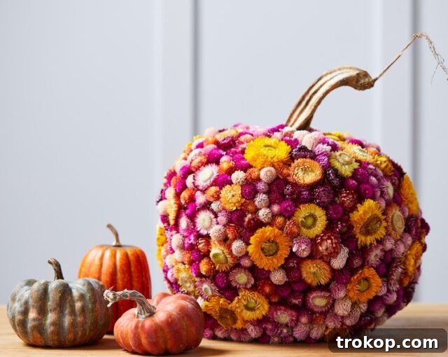 Creative Thanksgiving Table Decor: DIY Ideas for a Festive Feast 6 DIY dried floral pumpkin centerpiece for Thanksgiving