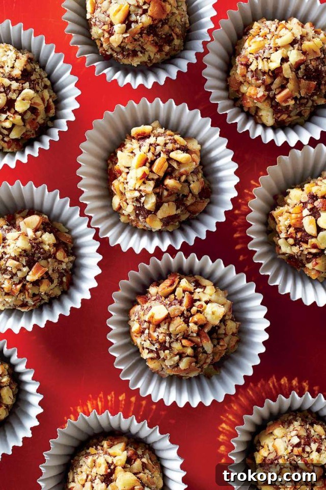 Elevate Your Thanksgiving Dinner Unforgettable Recipes 38 Fudgy Pecan Bourbon Balls Recipe for thanksgiving food ideas