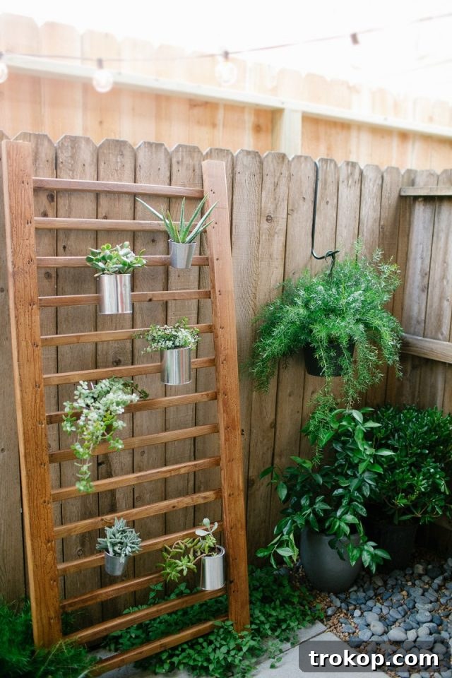 photo of a wooden handrail as a DIY vertical garden