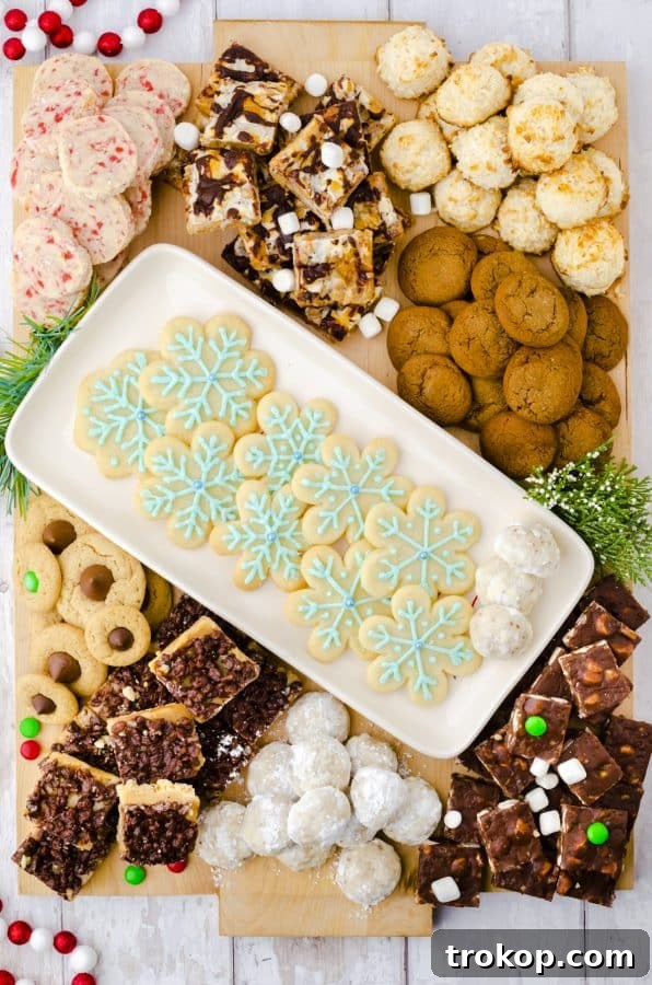 Holiday Cookie Masterclass: Recipes for Delicious Treats and Stunning Displays 12 A bountiful Christmas Homemade Cookie Charcuterie Board, arranged with various homemade cookies and festive garnishes.