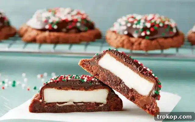 Holiday Cookie Masterclass: Recipes for Delicious Treats and Stunning Displays 19 Decadent Peppermint Pattie Snowdrifts, featuring a cookie base topped with a peppermint patty and rich chocolate ganache.