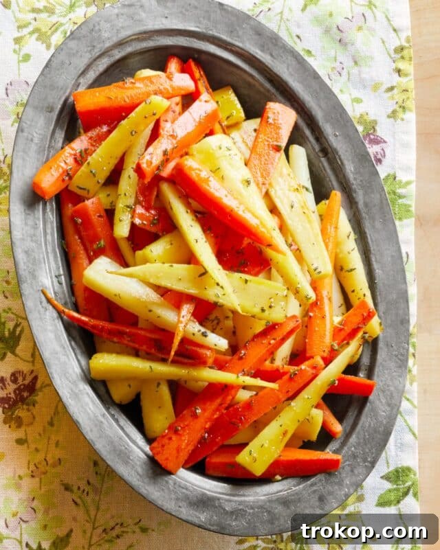 Honey-Glazed Carrots and Parsnips with fresh thyme, a delicious Christmas side dish.