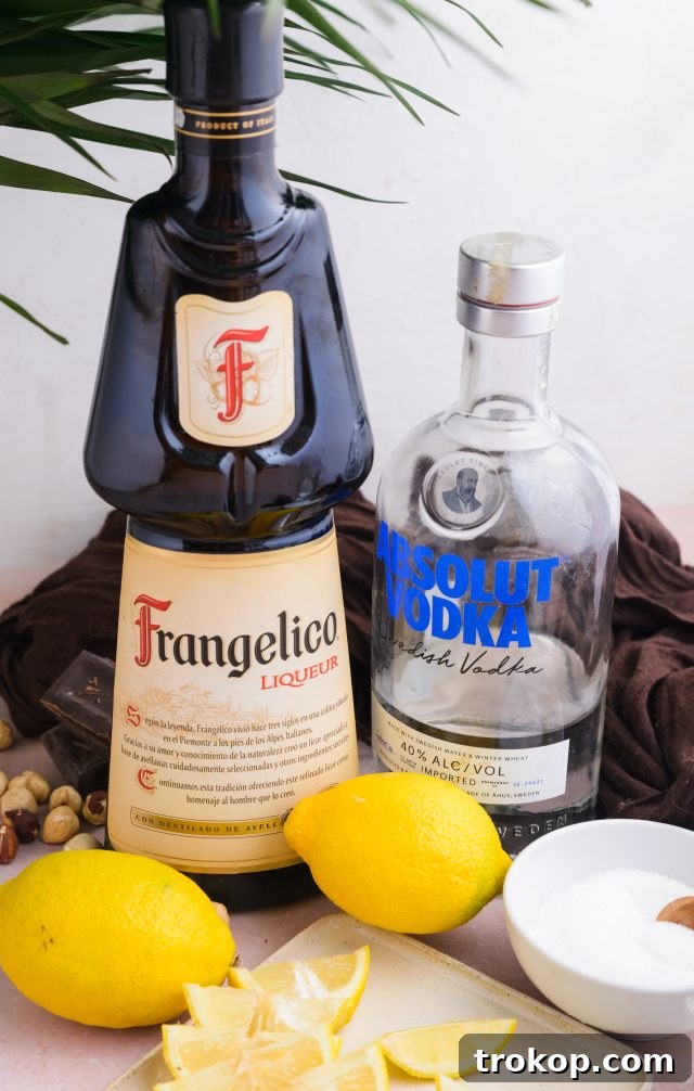Ingredients used to make the Chocolate Cake Shot, including Frangelico, vodka, lemon, and sugar