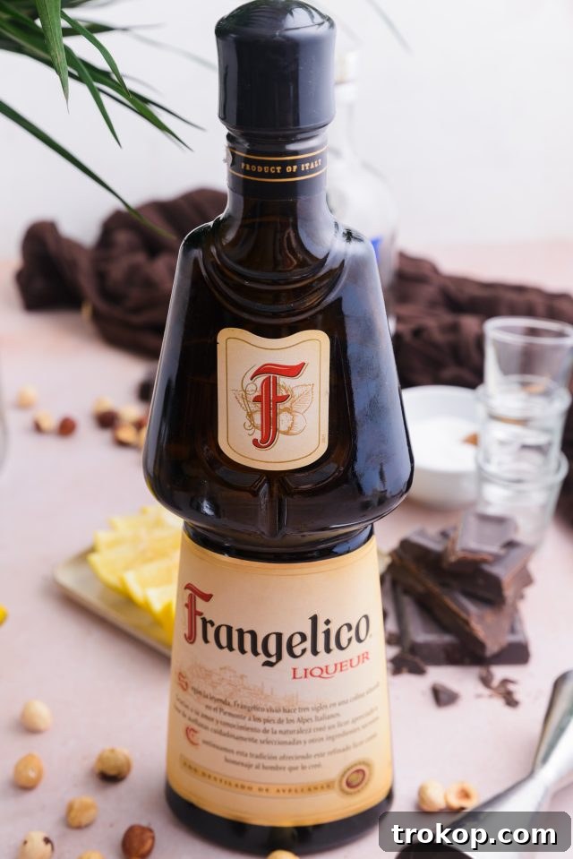 A bottle of Frangelico liqueur, a key ingredient for the Chocolate Cake Shot recipe