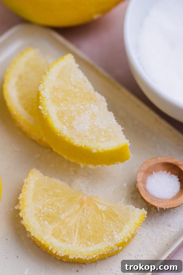 Lemon slices dipped in white granulated sugar, prepared for the Chocolate Cake Shot