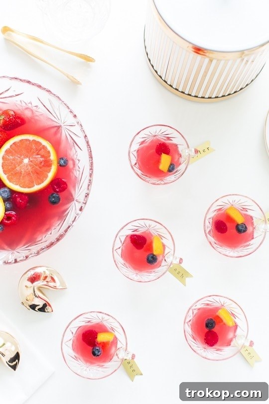 Creative Valentine's Day Party Concepts 12 Mixed berry punch recipe & brass drink tag DIY by sugarandcloth.com, a vibrant, refreshing beverage.