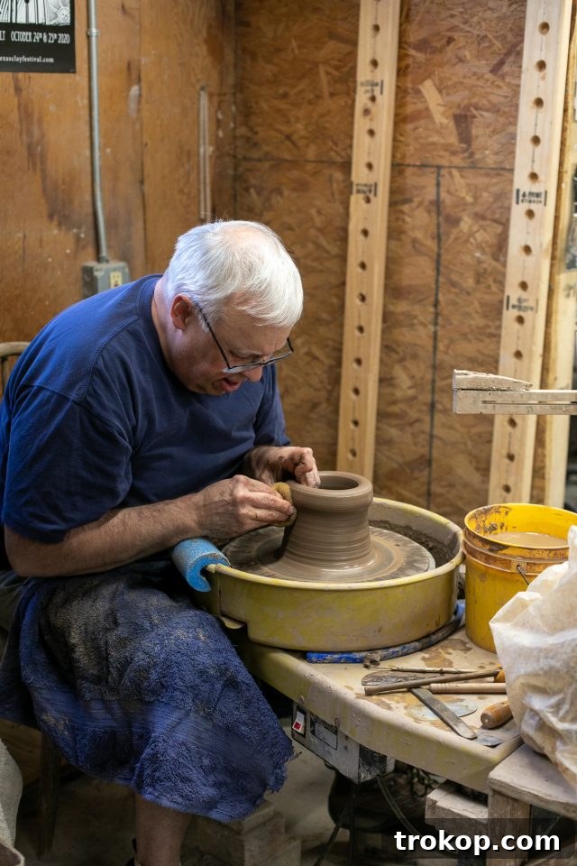 Explore New Braunfels: Attractions and Boutiques 27 Artist at work in The Barn Pottery studio in New Braunfels