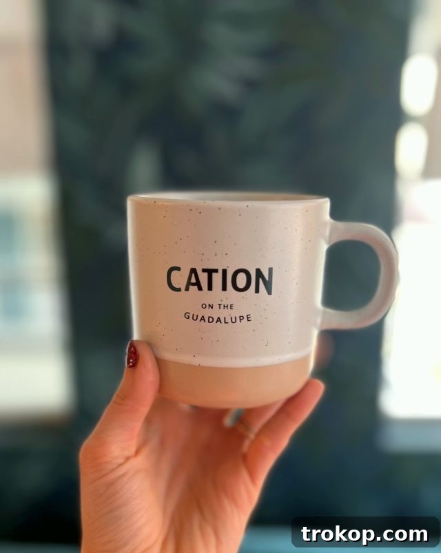 Explore New Braunfels: Attractions and Boutiques 6 Cation on the Guadalupe coffee mug in New Braunfels, Texas