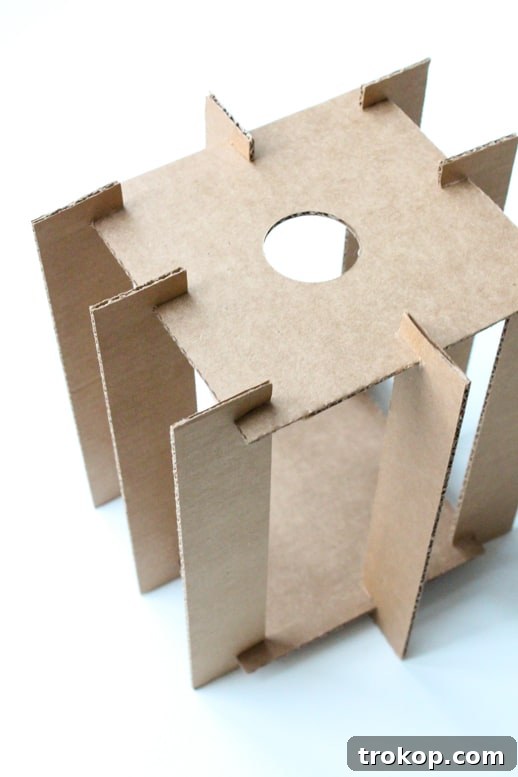 Reclaimed Cardboard Pendant Design 7 Final assembly of the cardboard pendant light frame, showing all strips interlocked