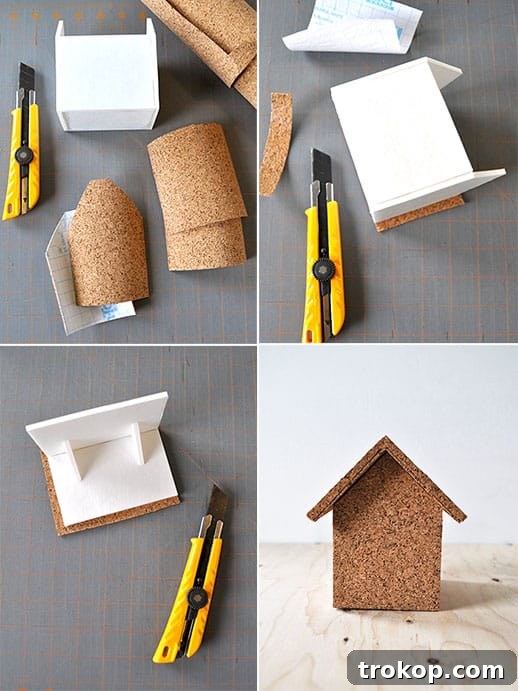 Detailed view of applying self-adhesive cork to the foam core house for a clean finish