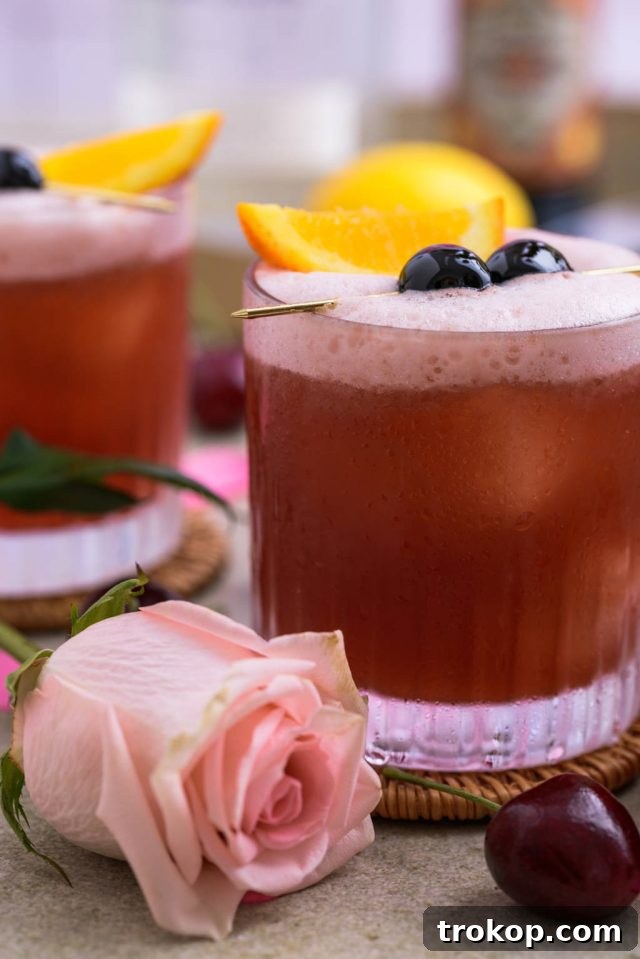 Sweet Cherry Vodka Sour Delight 8 front view of two glasses of Cherry vodka sour