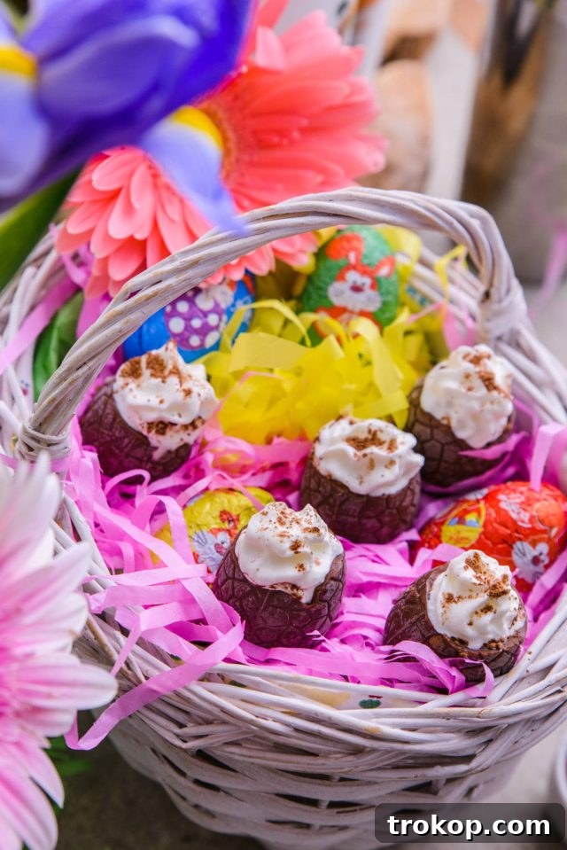 Easter's Colorful Shot Creations 7 Top view of Easter Egg Shots elegantly arranged in a basket lined with tissue paper, mimicking a nest.