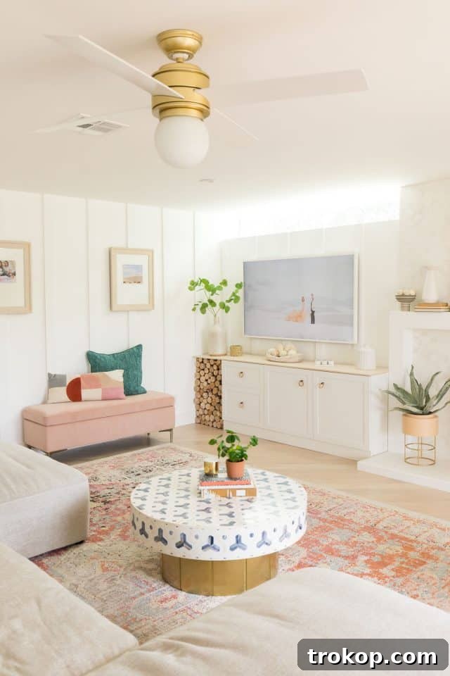 A stylish living room with a sectional sofa and a rug defining the space