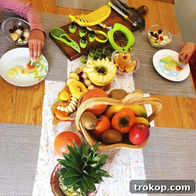 Brilliant Fruit Platter Ideas and Expert Presentation Tips 27 A fruit slicer set for easily preparing and cutting various fruits into attractive shapes for fruit platters, including melon ballers and carving tools.