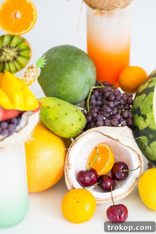 Brilliant Fruit Platter Ideas and Expert Presentation Tips 30 A colorful tropical fruit freakshake, showcasing a vibrant and indulgent dessert made with fresh fruits.