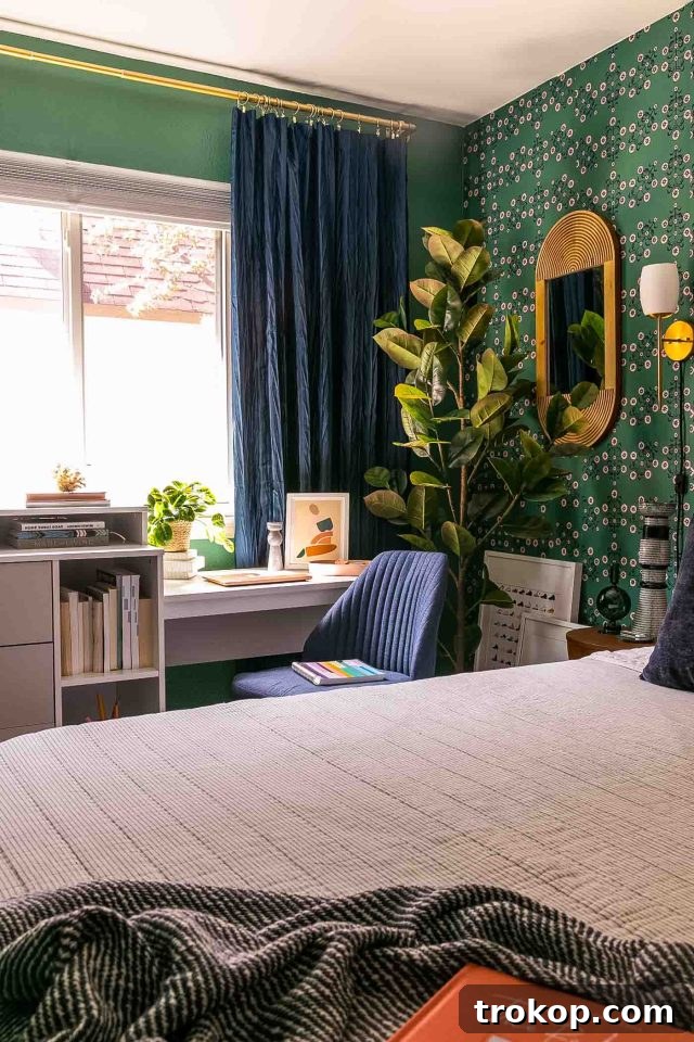 From Workspace to Dream Space The Reveal 6 An emerald green bedroom redesigned by Sugar & Cloth, showcasing vibrant walls and thoughtful decor.