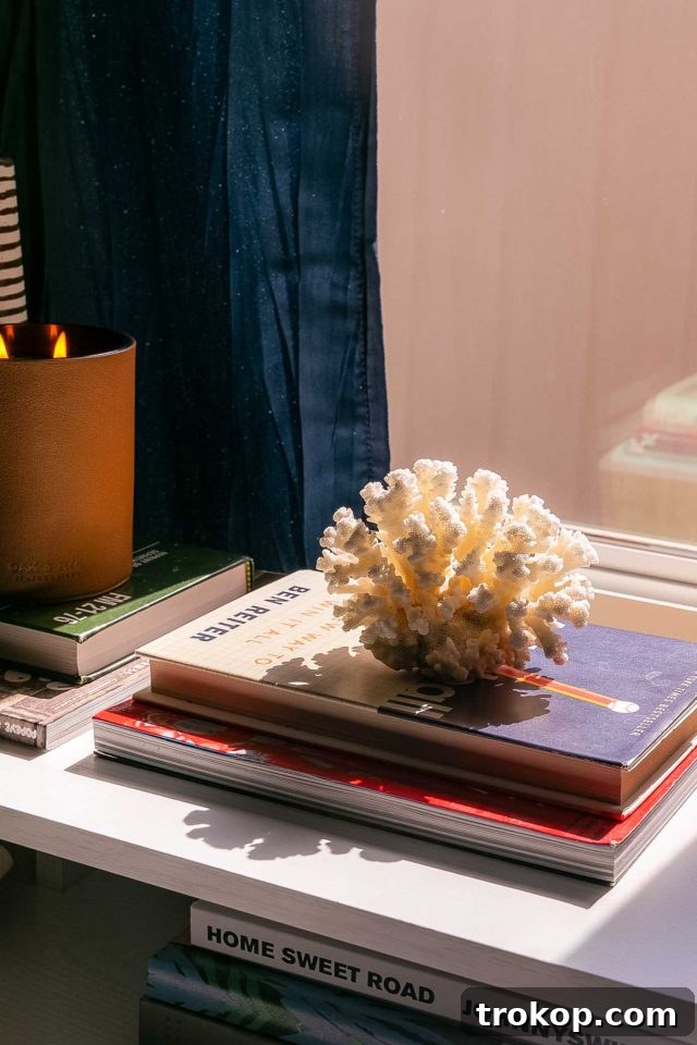 From Workspace to Dream Space The Reveal 9 Coral reef decor makes an office desk from Novogratz feel less like a desk and more like an integrated part of the bedroom.
