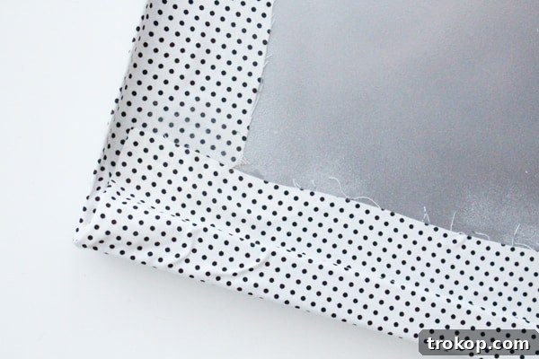 Craft Your Own Patterned Magnetic Board 6 Applying spray glue to the magnetic board