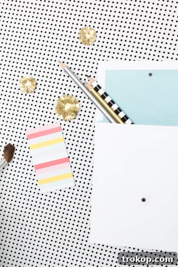 Craft Your Own Patterned Magnetic Board 7 Folding and gluing fabric edges on a DIY magnetic board