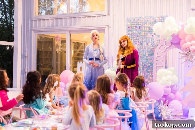 Winter Wonderland Birthday Bash 18 The enchanting appearance of Elsa and Anna from Frozen, making the party truly magical