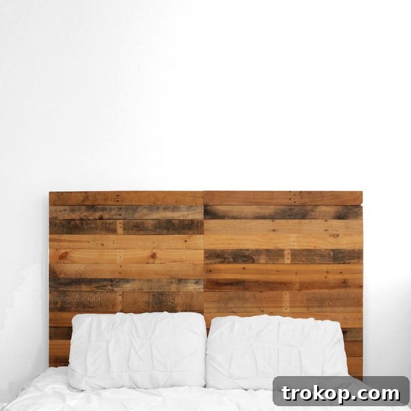 Rustic Pallet Wood Headboard adding a creative and budget-friendly touch to bedroom decor, perfect for DIY pallet projects