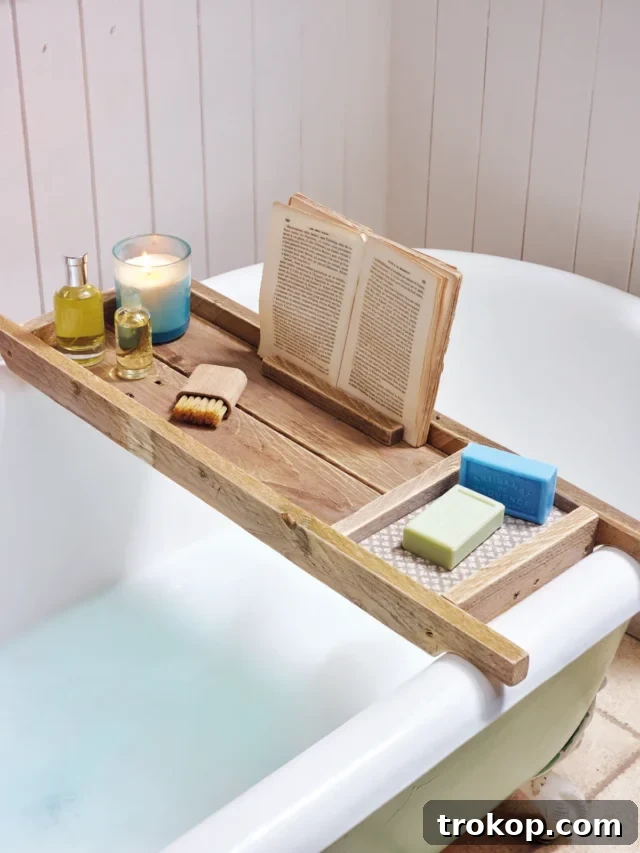 Rustic pallet bathtub tray elegantly holding bath essentials like soap, a book, and a glass of wine for a relaxing soak