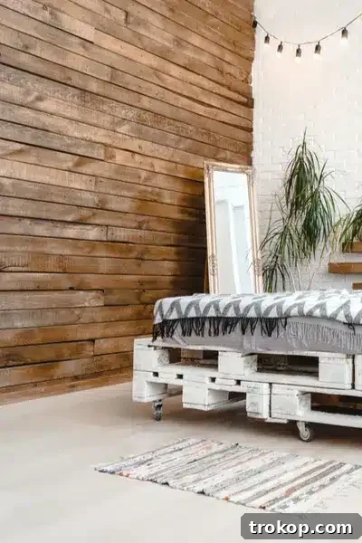 Stunning DIY pallet accent wall transforming a room with reclaimed wood planks, offering a cost-effective and unique home improvement project