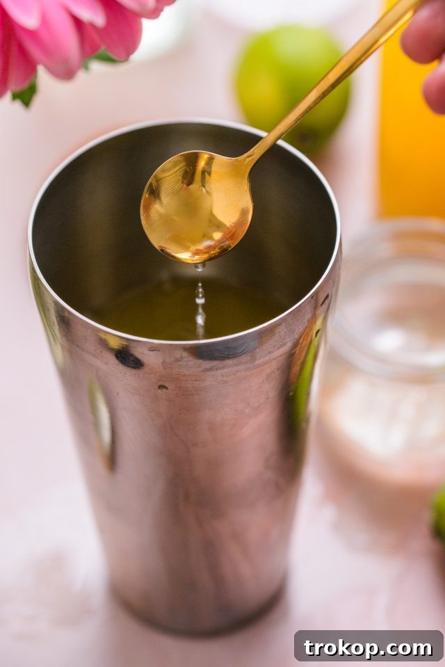 Use simple syrup to sweeten a gin and juice recipe if needed