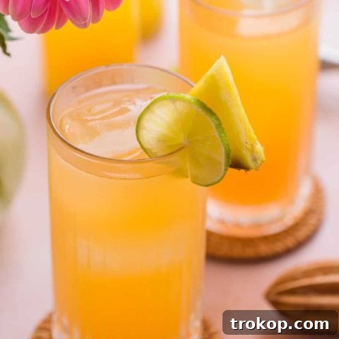 Tropical Gin and Juice recipe with a tropical twist by Sugar and Cloth