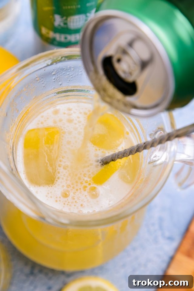Brewing Refreshing Summer Ales 6 Light Beer Cocktail in a glass with lemon garnish