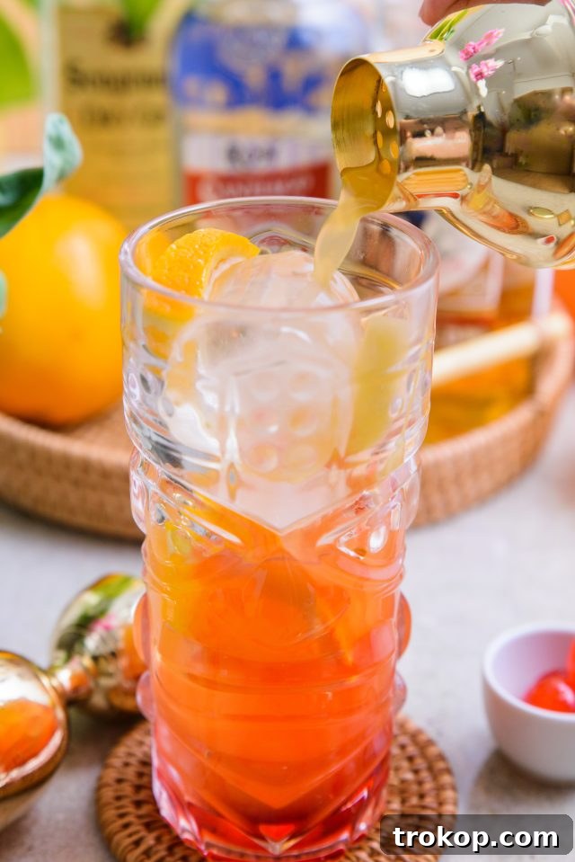 Best Scorpion Bowl Recipe in a Tiki Glass with umbrella