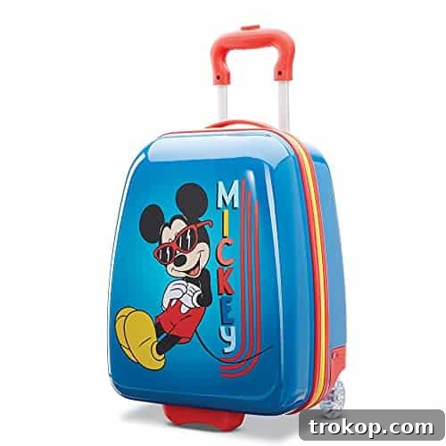 Make Travel a Breeze: 21 Top Kids' Luggage, From Carry-Ons to Ride-Ons 6 AMERICAN TOURISTER Kids' Disney Hardside Upright Luggage, Mickey, Carry-On 18-Inch